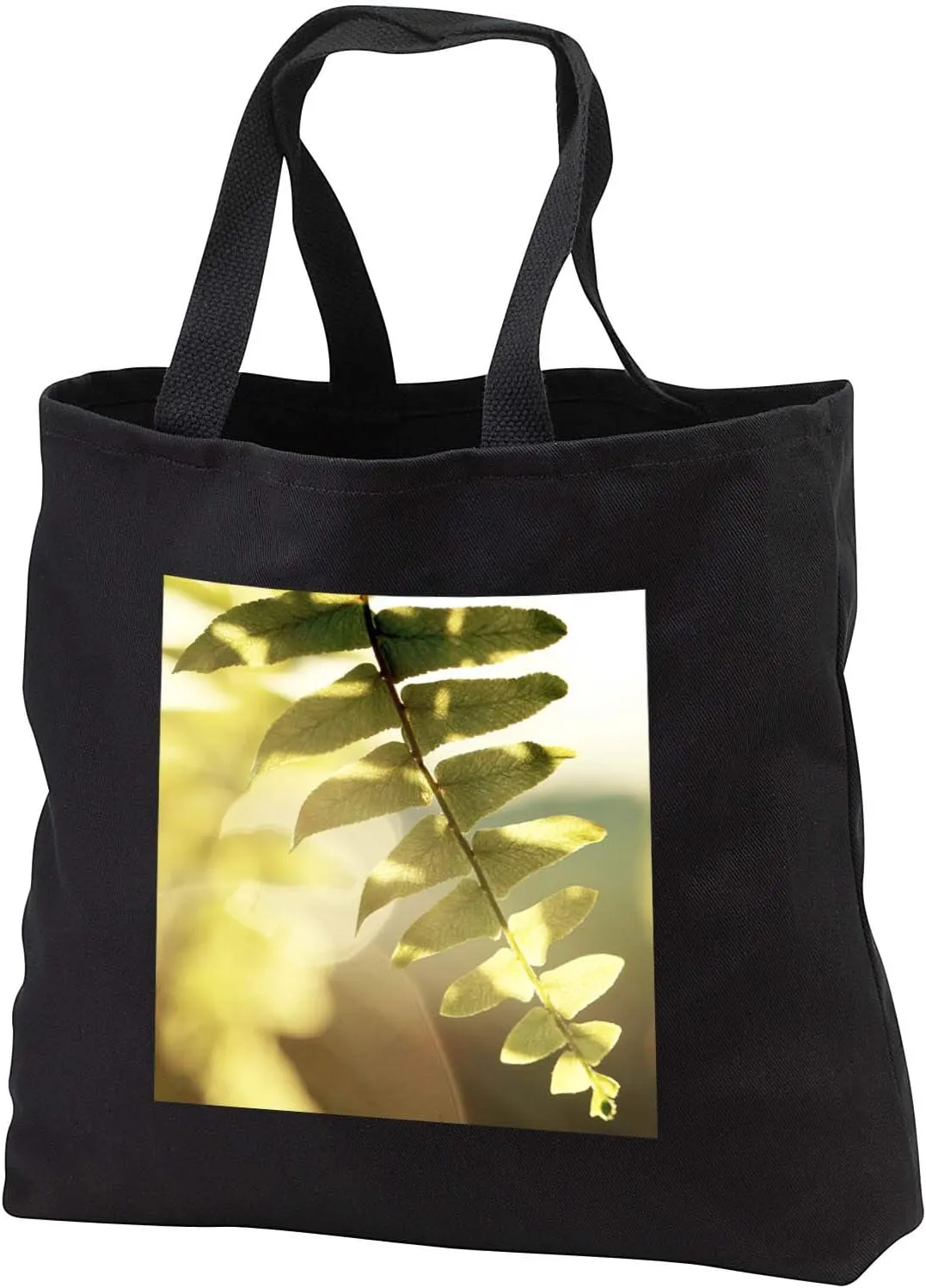 3dRose A macro photograph of a fern leaf being backlit by the sun. - Tote Bags (tb_337825)