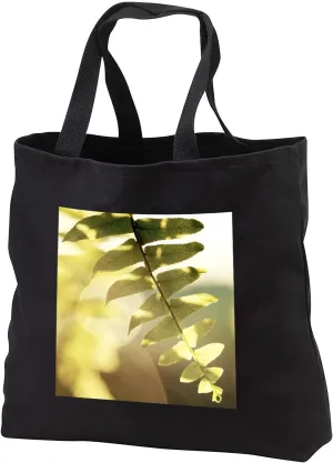 3dRose A macro photograph of a fern leaf being backlit by the sun. - Tote Bags (tb_337825)