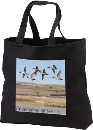 3dRose Northern Pintail ducks in courtship flight near Choteau, Montana, USA - Tote Bags (tb_331658)