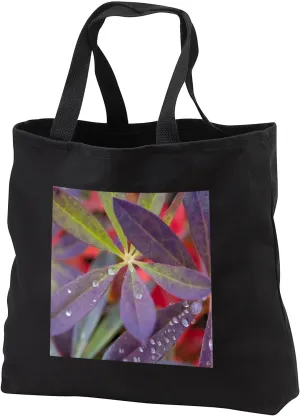 Black Tote Bag 14w x 14h x 3d - USA, Alaska, Brooks Range. Dewdrops on lupine leaves. Autumn